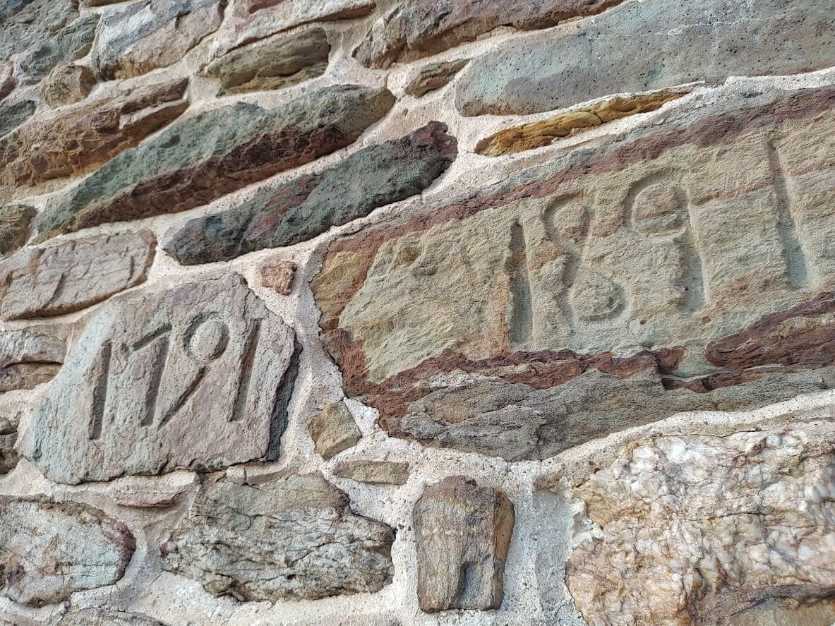 Dates engraved into the bank barn